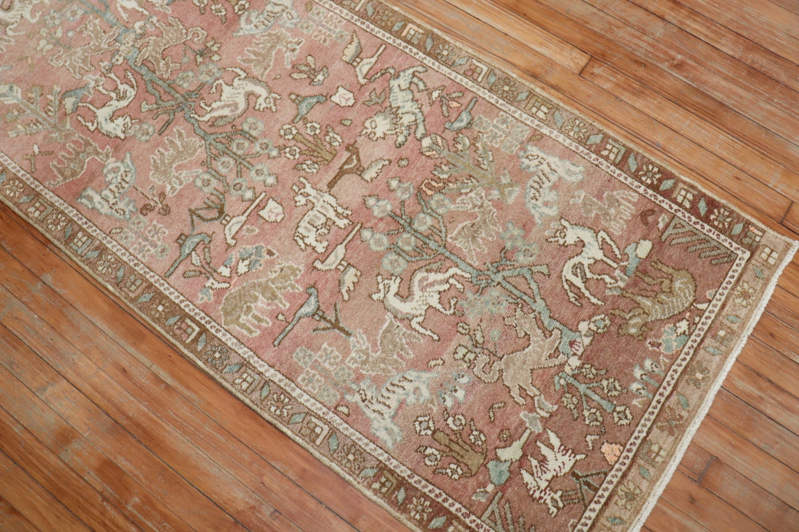 2' 9" x 9' 8" Persian runner with animal pictorial motif: 2' 9" x 9' 8" Persian runner with animal pictorial motif Mid 20th century Persian pictorial runner in a neutral color palette, featuring an animal motif. Pre-owned condition. Specifications Type: Pers