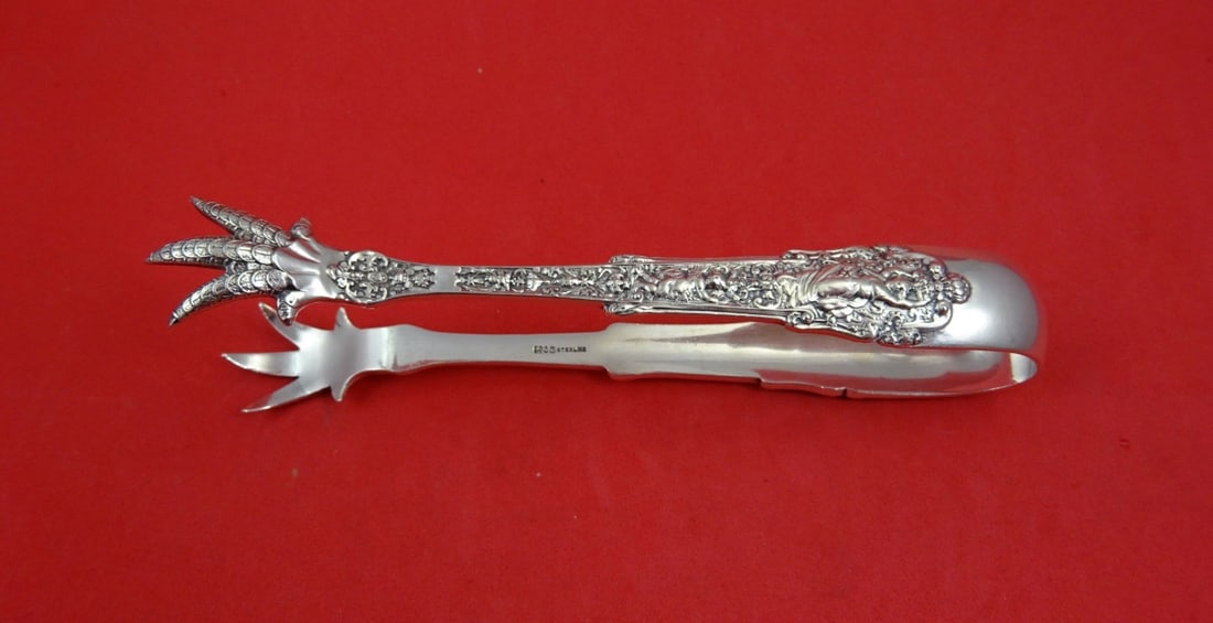 Sterling Silver Sugar Tong Coligni Pattern 5 Inch by Gorham: Sterling Silver Sugar Tong Coligni Pattern 5 Inch by Gorham This is a sterling silver sugar tong in the Coligni multi-motif pattern by Gorham. Measuring 5 inches in length, this serving tong was craft