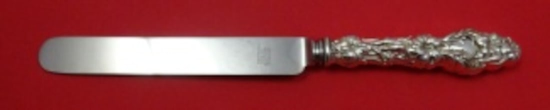 Whiting Lily Sterling Silver Dinner Knife Hollow Fat Handle 9 7/8": Whiting Lily Sterling Silver Dinner Knife Hollow Fat Handle 9 7/8" Introducing the exquisite Lily by Whiting dinner knife, a stunning piece crafted from high-quality sterling silver (.925). This knife