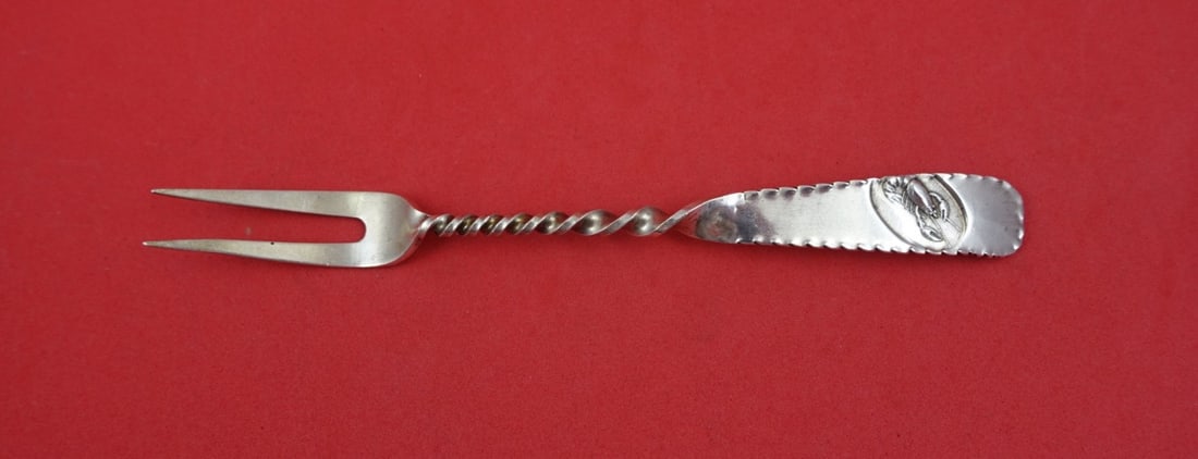 Sterling Silver 6 Inch Cocktail Fork Hamburg Pattern by Gorham: Sterling Silver 6 Inch Cocktail Fork Hamburg Pattern by Gorham This is a sterling silver cocktail fork in the Hamburg pattern by Gorham. Featuring two tines and a lobster motif, this fork measures 6 i