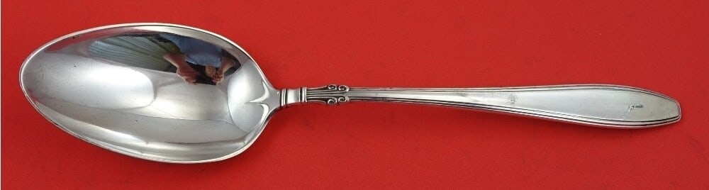 Gorham Nocturne Sterling Silver Serving Spoon 8 3/4 Inches: Gorham Nocturne Sterling Silver Serving Spoon 8 3/4 Inches This exquisite serving spoon is crafted from sterling silver and features the elegant Nocturne pattern by Gorham. Measuring 8 3/4 inches in l