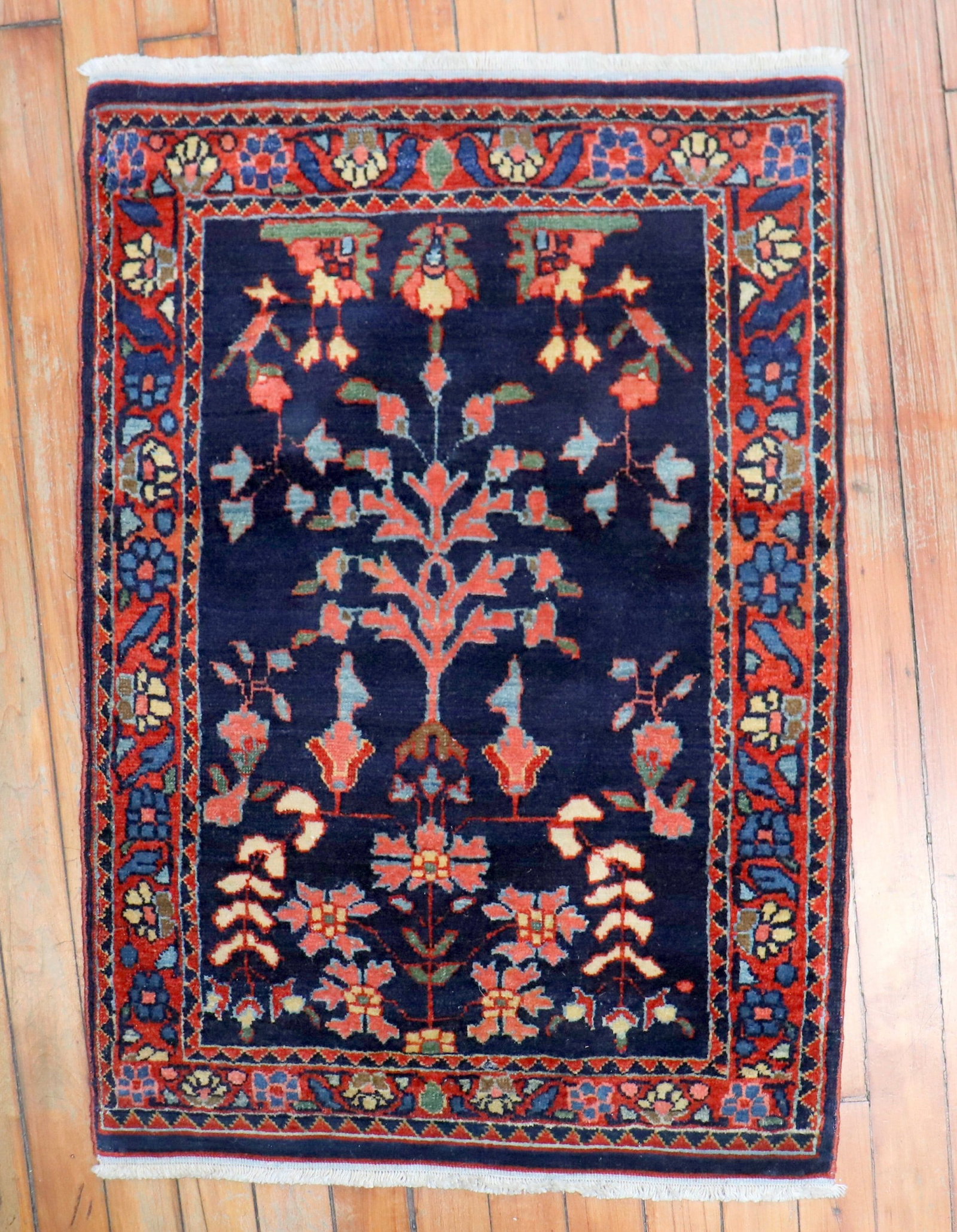 1' 10" x 2' 7" Persian Sarouk Yastik Carpet: 1' 10" x 2' 7" Persian Sarouk Yastik Carpet Authentic early 20th-century Persian Sarouk rug in a jewel-toned navy palette, featuring a traditional formal design. This pre-owned carpet is categorized a
