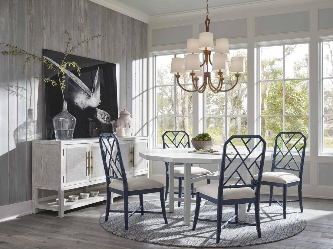 Universal Hanalei Bay Chair with Cerulean Blue Upholstery: Universal Hanalei Bay Chair with Cerulean Blue Upholstery Introducing the Hanalei Bay Chair, a stunning addition to your living space. This stylish side chair features a plush upholstered seat, offeri