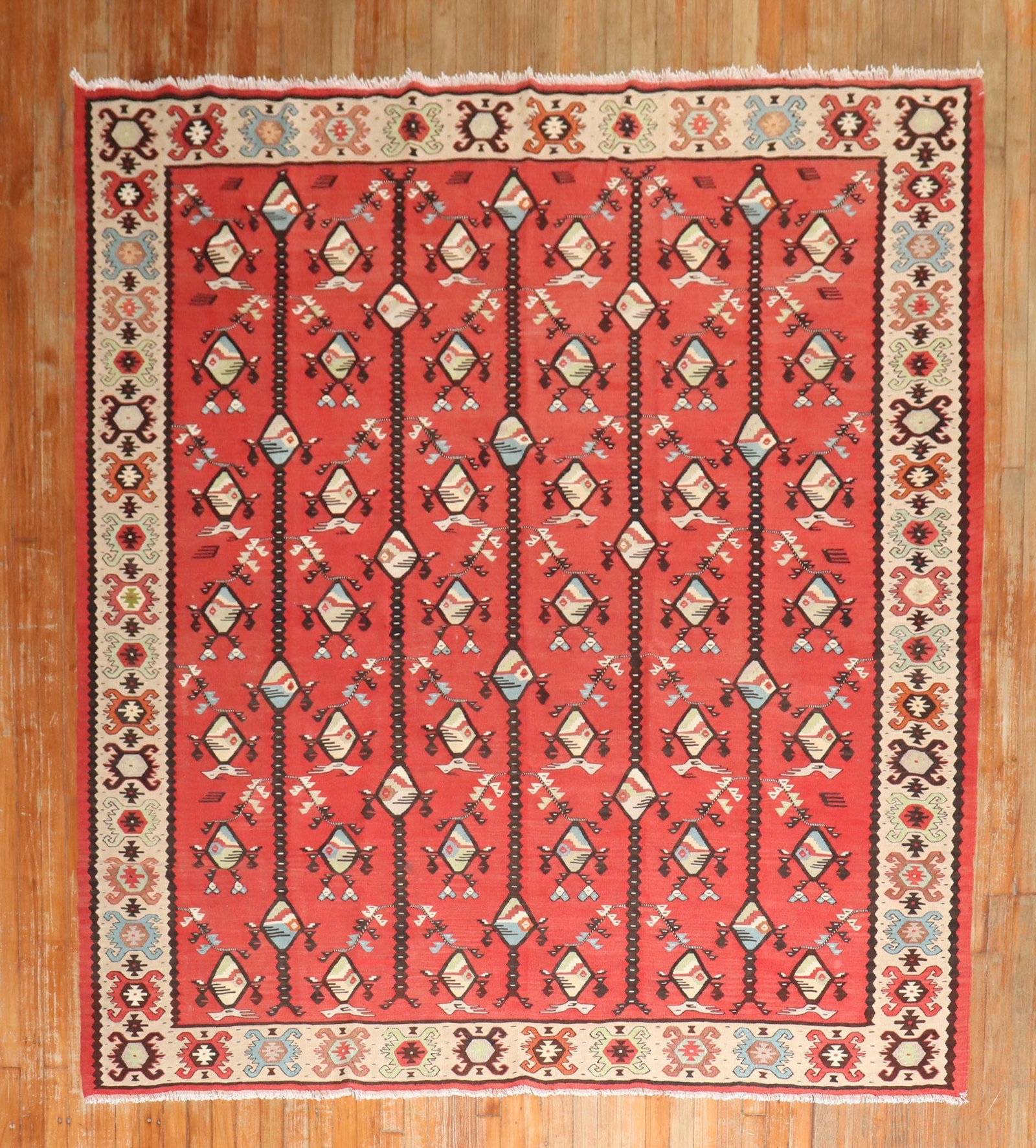 7' x 8' Turkish Kilim Rug Red Geometric Square Mid 20th Century: 7' x 8' Turkish Kilim Rug Red Geometric Square Mid 20th Century Mid-20th century Turkish kilim featuring a geometric design on a red field. This pre-owned square-format rug offers a traditional tribal