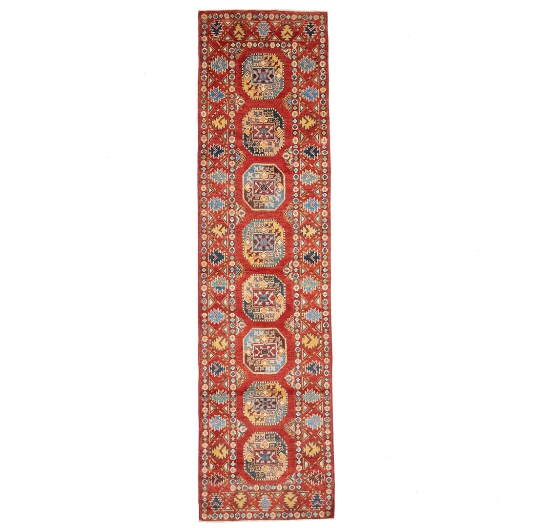Wool Hand Knotted Kazak Tribal Runner 2'7 x 9'11: Wool Hand Knotted Kazak Tribal Runner 2'7 x 9'11 Enhance your living space with this stunning Tribal Geometric Kazak Runner Rug. Measuring 2'7" x 9'11", this hand-knotted rug showcases a vibrant color