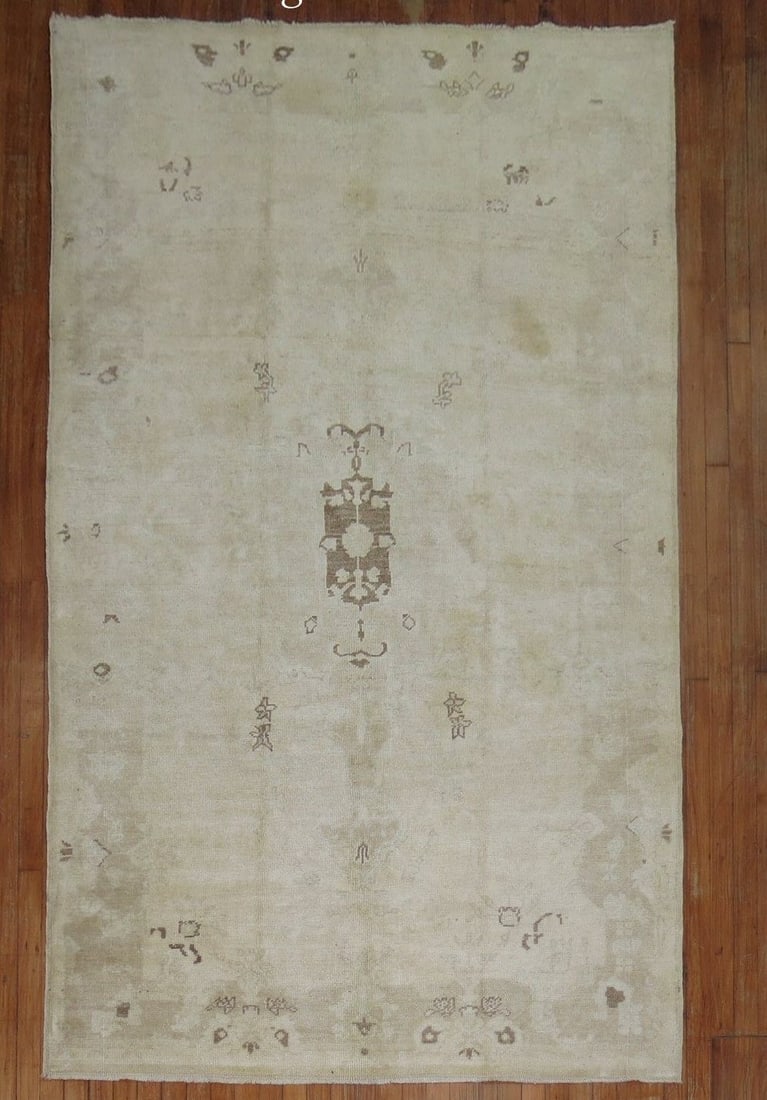 5' 1" x 8' 8" Mid 20th Century Turkish Oushak Rug: 5' 1" x 8' 8" Mid 20th Century Turkish Oushak Rug Vintage Turkish Oushak rug from the mid-20th century. This pre-owned piece is identified as an intermediate category Oushak. Specifications Item Type: