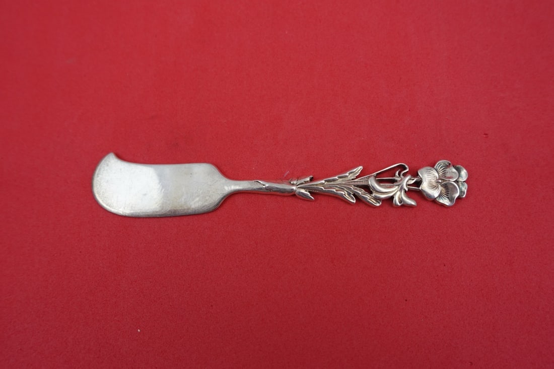 Sterling Silver Pate Knife Flora Pattern Pansy Pierced by Shiebler 4 5/8 Inch: Sterling Silver Pate Knife Flora Pattern Pansy Pierced by Shiebler 4 5/8 Inch This is a sterling silver pate knife in the Flora pattern by Shiebler, featuring a pierced pansy design. The knife is not 