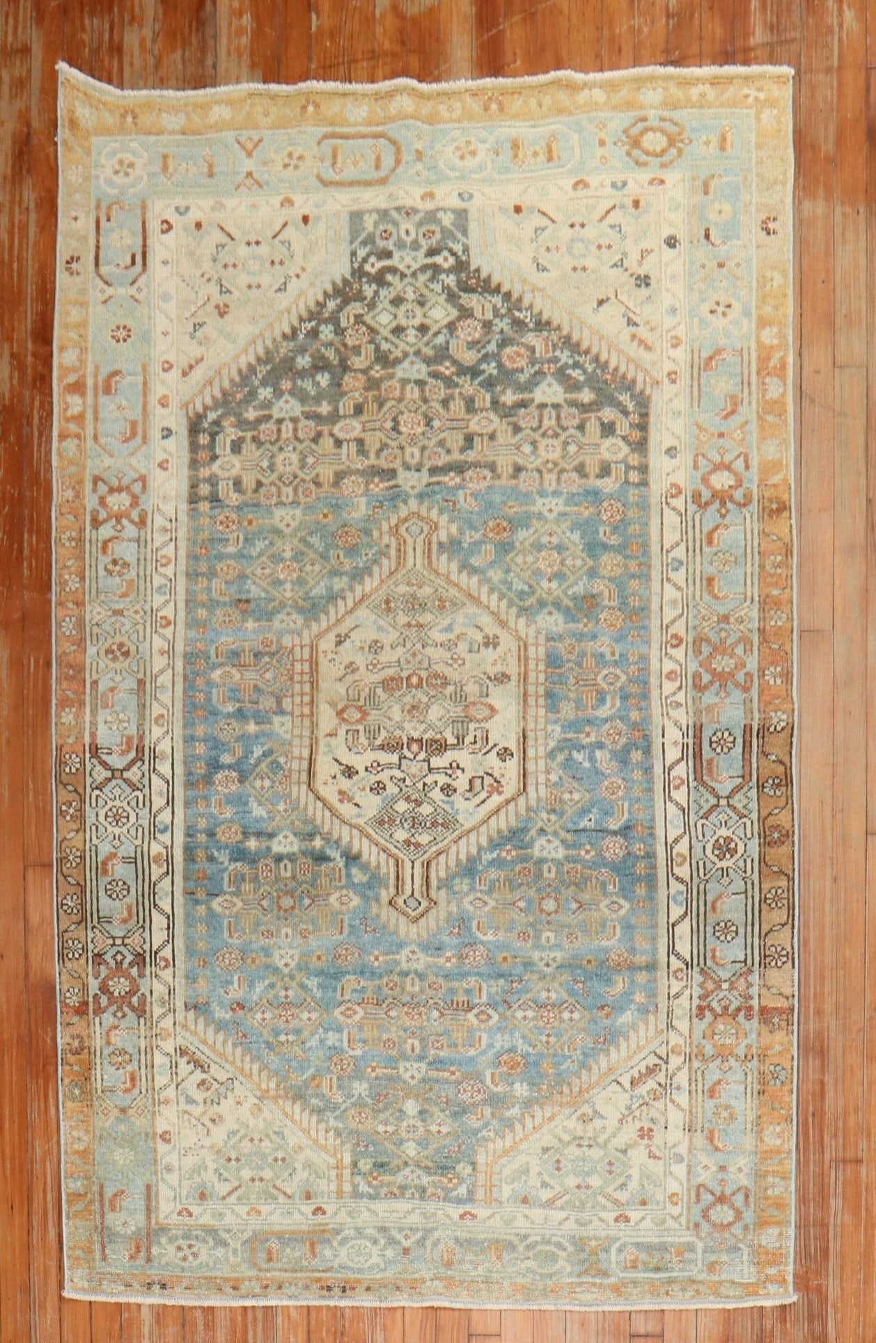 4' 5" x 6' 8" Early 20th Century Persian Malayer Rug: 4' 5" x 6' 8" Early 20th Century Persian Malayer Rug Early 20th century Persian Malayer accent rug with a tribal design. This pre-owned piece is identified as a Malayer rug and is offered in accent si