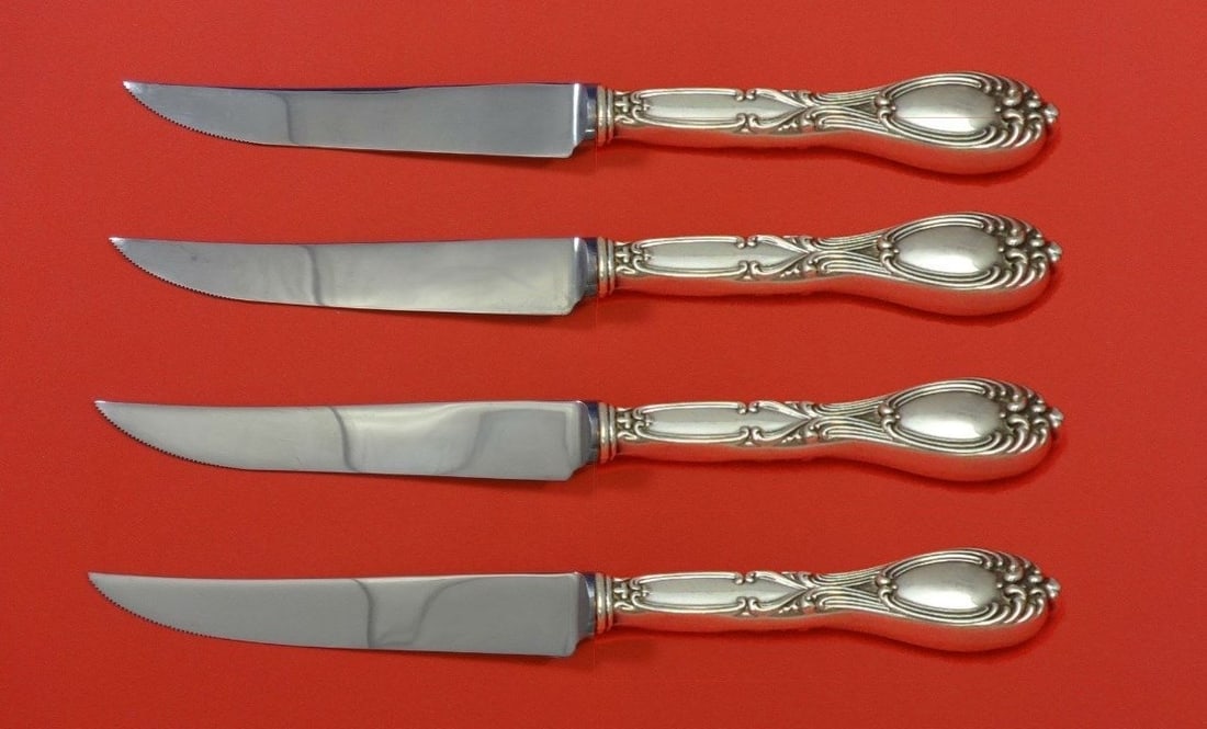 Frank Whiting Victoria Florence Sterling Silver Steak Knife Set 4pc: Frank Whiting Victoria Florence Sterling Silver Steak Knife Set 4pc This exquisite 4-piece steak knife set features the elegant Victoria aka Florence pattern by Frank Whiting. Crafted from high-qualit