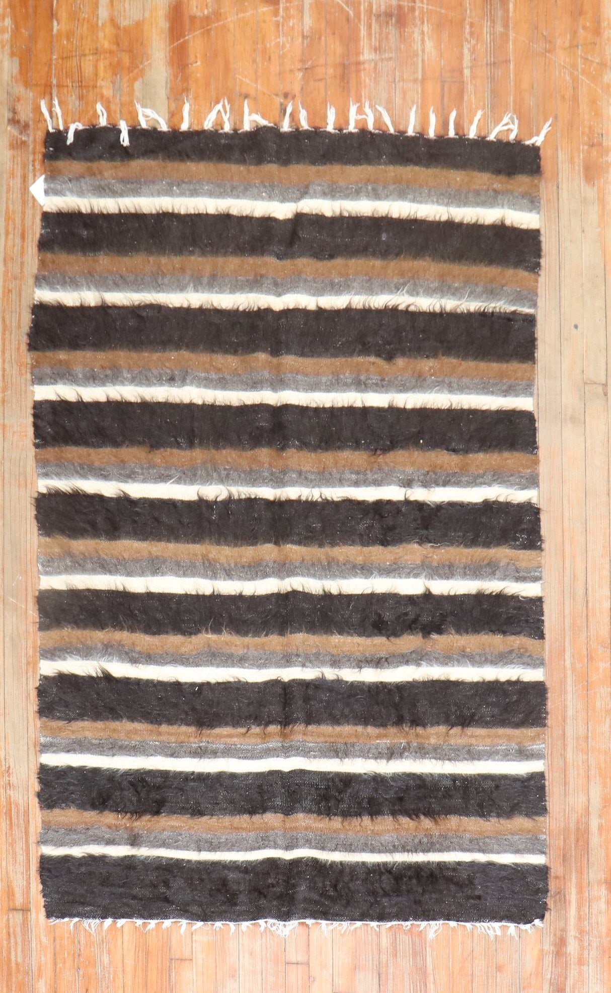4' 1" x 6' 2" Turkish mohair accent rug with stripes: 4' 1" x 6' 2" Turkish mohair accent rug with stripes Mid-20th century Turkish mohair rug with a striped design. This pre-owned accent rug offers a classic textile look suited to a variety of interiors