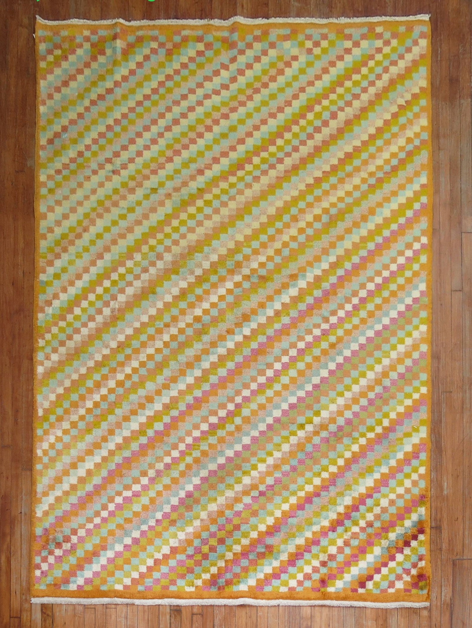7' 1" x 10' 4" Vintage Turkish Deco Room Rug: 7' 1" x 10' 4" Vintage Turkish Deco Room Rug A vintage Turkish Deco room rug from the 20th century, featuring wild colors and a geometric patterned design. Specifications Type: Turkish Deco rug Catego