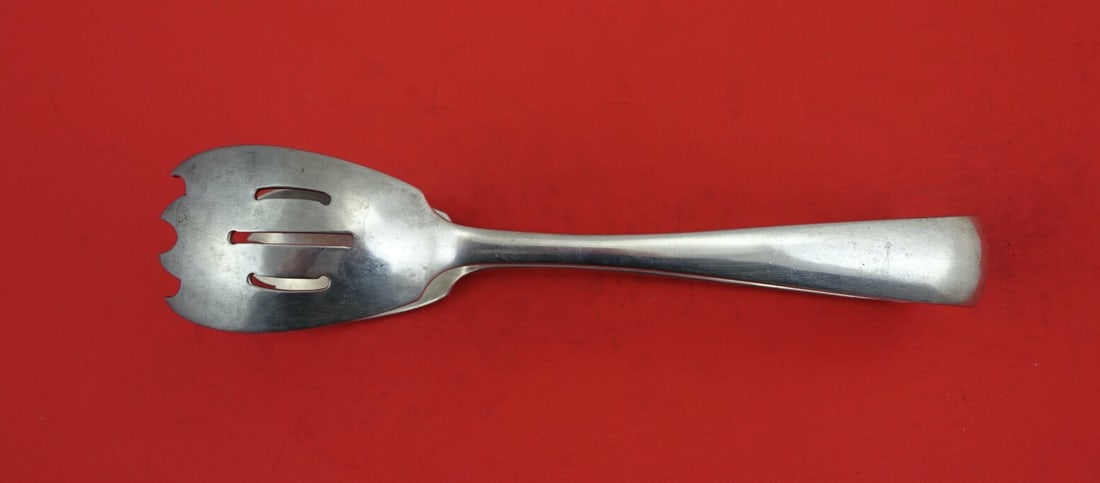 Arthur Stone Sterling Silver Round End Ice Tong 7 1/8": Arthur Stone Sterling Silver Round End Ice Tong 7 1/8" This exquisite ice tong, crafted by Arthur Stone, features a round end design in the elegant Round End pattern. Made of high-quality sterling sil