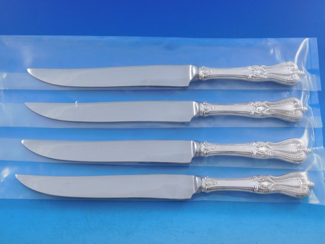 Towle Old Colonial Sterling Silver Steak Knife Set 4pc Texas Sized 10": Towle Old Colonial Sterling Silver Steak Knife Set 4pc Texas Sized 10" Discover the elegance of the Old Colonial by Towle Sterling Silver Steak Knife Set, featuring four impressive Texas-sized steak k