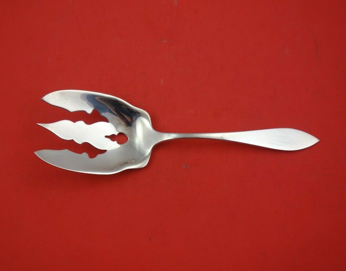 Stieff Clinton Sterling Silver Serving Fork 9 1/4 Inch Elegant Design: Stieff Clinton Sterling Silver Serving Fork 9 1/4 Inch Elegant Design This exquisite vegetable serving fork is part of the Clinton pattern by Stieff, crafted from high-quality sterling silver. Measuri