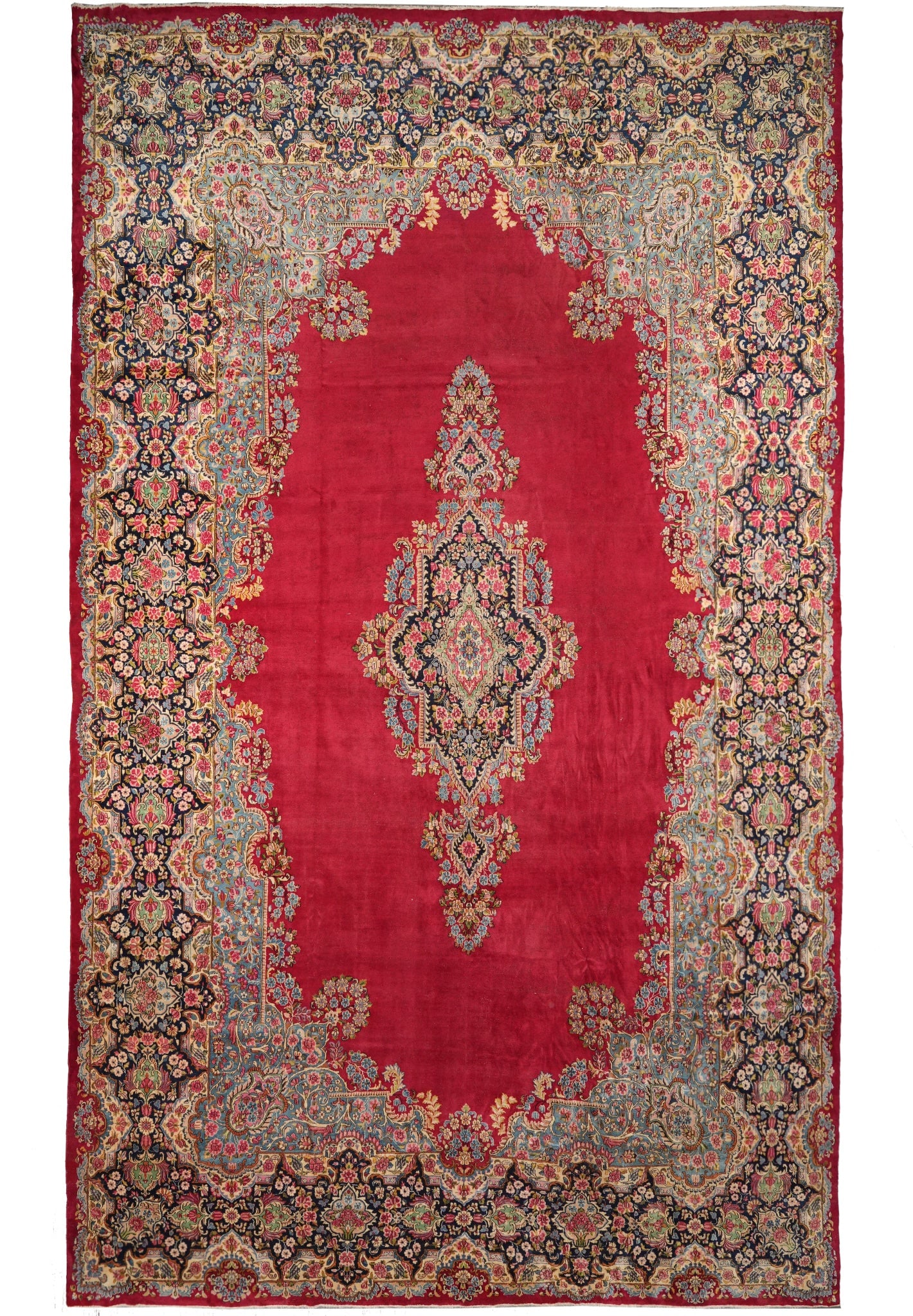 13 x 21 Semi-Antique Persian Kerman Rug Open Red Field Wool: 13 x 21 Semi-Antique Persian Kerman Rug Open Red Field Wool Free continental US Shipping This 13 x 21 semi-antique Persian Kerman rug features an open red field with floral motifs and graceful borders