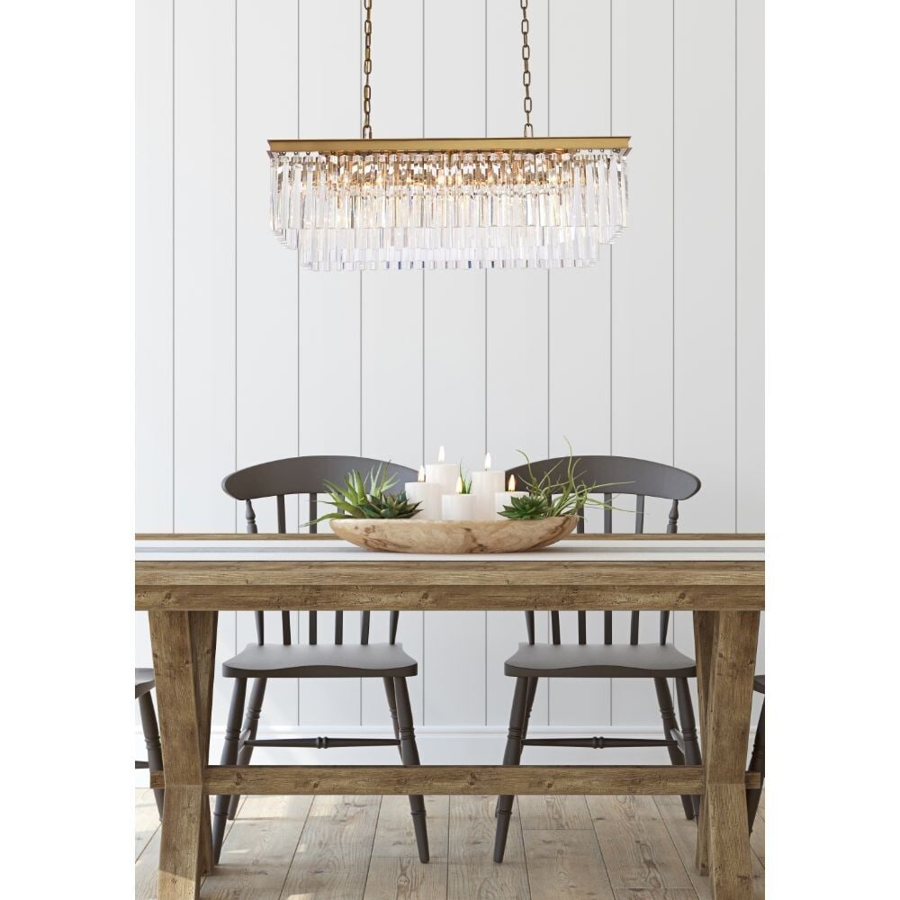 Sydney 12 Light Crystal Chandelier Satin Gold 40 in: Sydney 12 Light Crystal Chandelier Satin Gold 40 in Modern crystal chandelier in a satin gold finish with clear crystals. It is a 12-light fixture designed for indoor use and features an adjustable he