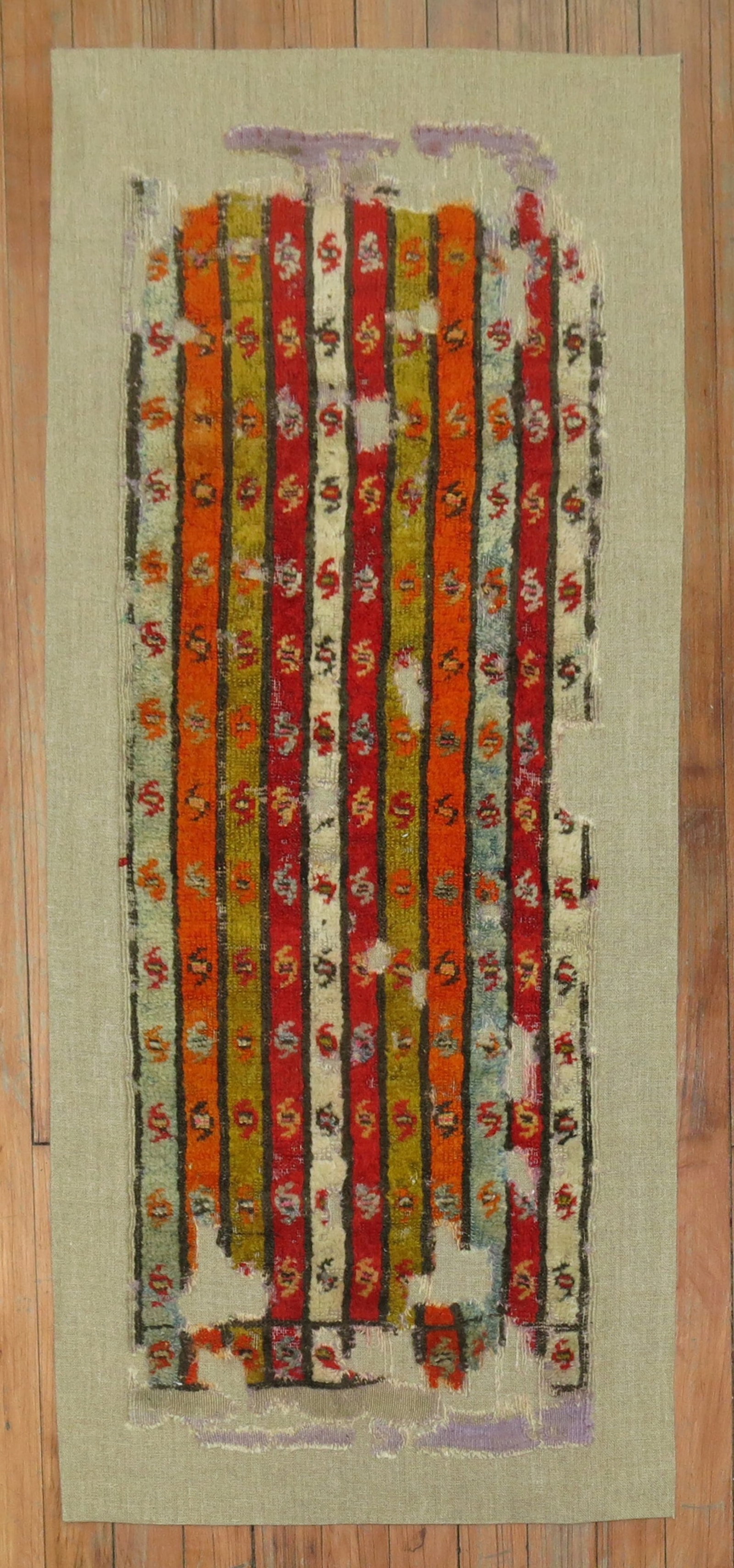 1' 9" x 3' 9" Antique Turkish Ghiordes Yastik Rug: 1' 9" x 3' 9" Antique Turkish Ghiordes Yastik Rug Late 18th century antique Turkish Ghiordes rug stitched onto canvas-like linen. This textile can be used as a wall piece or as a floor covering, and i
