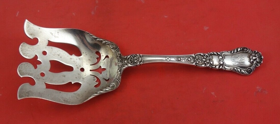 Gorham Baronial Old Sterling Silver Asparagus Fork 8 7/8": Gorham Baronial Old Sterling Silver Asparagus Fork 8 7/8" This exquisite asparagus fork is crafted from sterling silver and features the elegant Baronial Old pattern by Gorham. Measuring 8 7/8 inches,