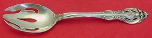 Gorham La Scala Sterling Silver Pierced Serving Spoon 8 3/4": Gorham La Scala Sterling Silver Pierced Serving Spoon 8 3/4" This exquisite serving spoon is crafted from high-quality sterling silver and features a beautiful pierced design in the renowned La Scala 