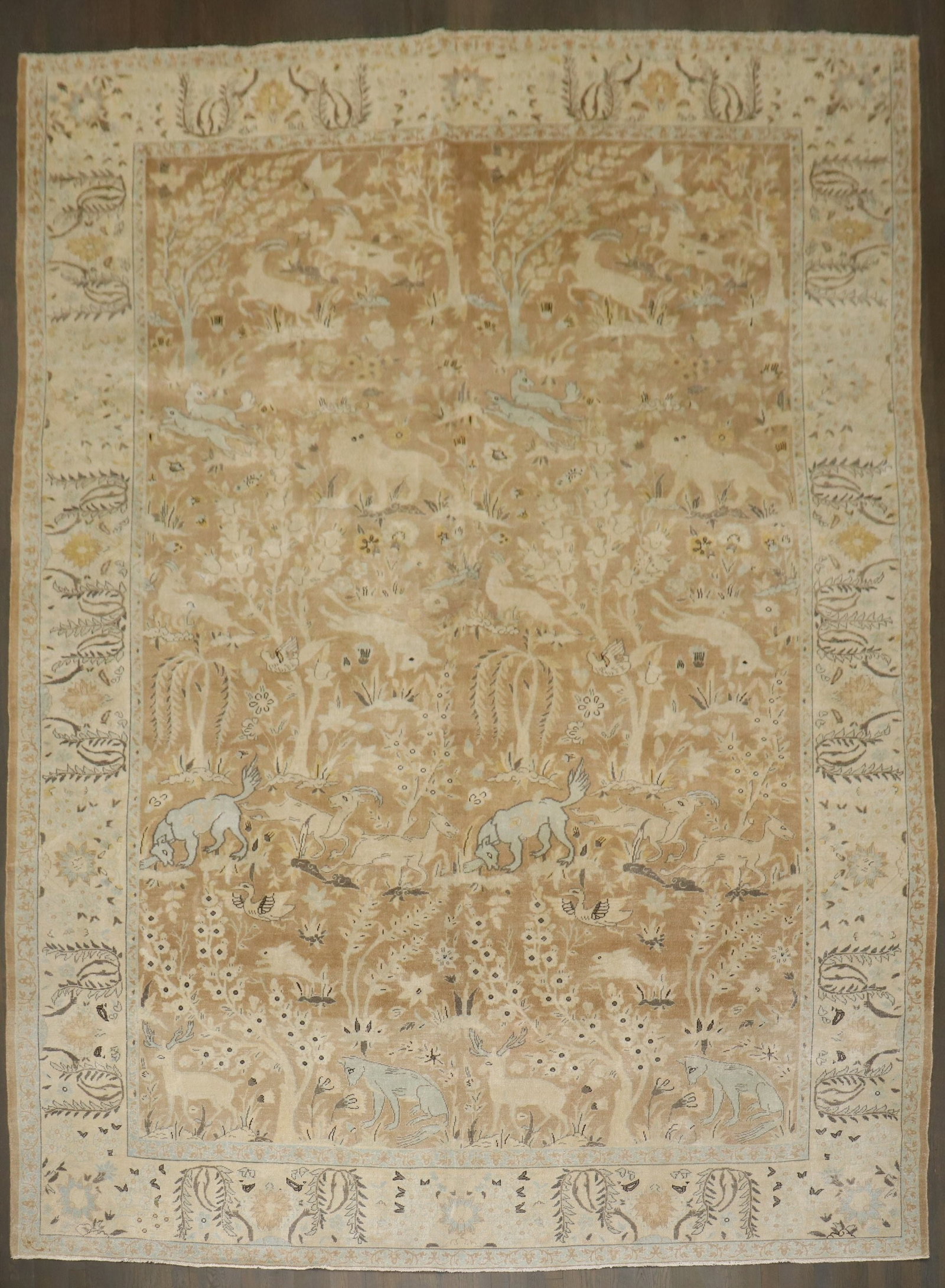 9' 9" x 13' 9" Indian Lahore Pictorial Animal Motif Rug: 9' 9" x 13' 9" Indian Lahore Pictorial Animal Motif Rug Early 20th-century Indian Lahore pictorial rug featuring an animal motif in neutral tones. This pre-owned room-size rug presents a classic Lahor