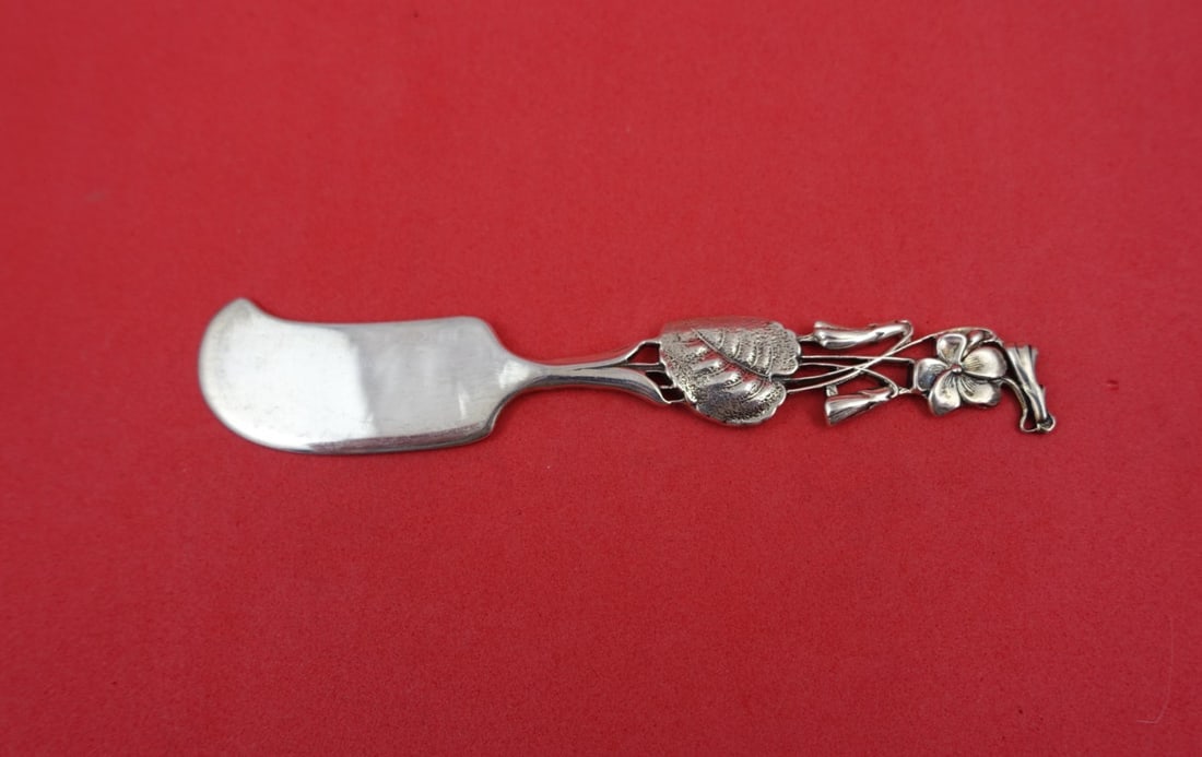 Sterling Silver Pate Knife Flora Pattern by Shiebler Violet Pierced 4 5/8 Inch: Sterling Silver Pate Knife Flora Pattern by Shiebler Violet Pierced 4 5/8 Inch This sterling silver pate knife is crafted by Shiebler in the Flora pattern and features a distinctive violet-pierced des