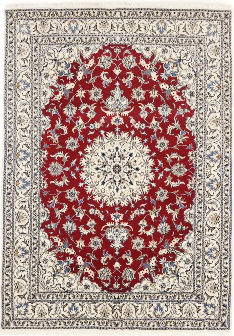 Red Floral Hand-Knotted Wool Indo-Nain Area Rug 5'7 x 8'0: Red Floral Hand-Knotted Wool Indo-Nain Area Rug 5'7 x 8'0 This handmade Indo-Nain area rug features a classic floral design in red, ivory, cream, khaki, and light blue tones. Crafted from wool using a