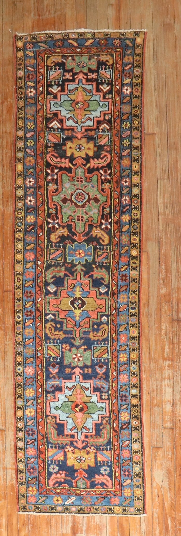 2' 3" x 8' 6" Persian Serapi Heriz rug runner: 2' 3" x 8' 6" Persian Serapi Heriz rug runner Early 20th century Persian Heriz narrow runner in the Serapi/Heriz type. This pre-owned rug features the classic long, narrow runner format. Specification