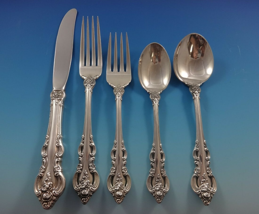 Towle El Grandee Sterling Silver 60 Piece Flatware Set for 12: Towle El Grandee Sterling Silver 60 Piece Flatware Set for 12 This elegant El Grandee flatware set by Towle features intricate, handcrafted detailing on each piece, making it a sophisticated choice fo