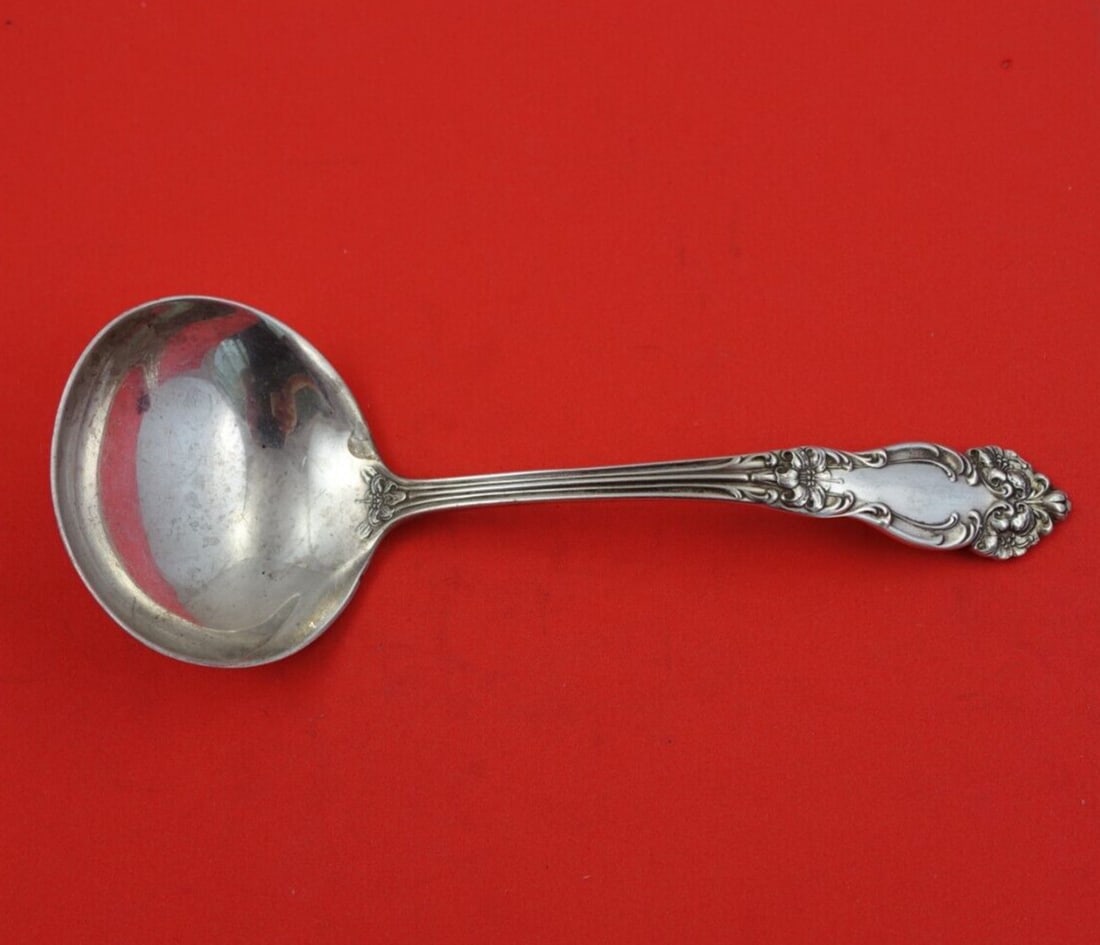 Reed and Barton Amaryllis Sterling Silver Gravy Ladle 6 7/8 Inch: Reed and Barton Amaryllis Sterling Silver Gravy Ladle 6 7/8 Inch This exquisite gravy ladle, part of the Amaryllis pattern by Reed and Barton, showcases the timeless elegance of sterling silver crafts