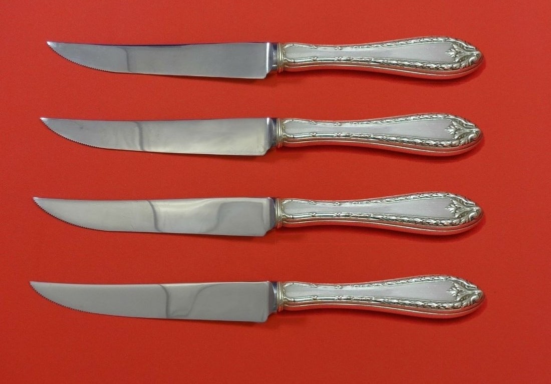 Dominick & Haff Marie Antoinette Sterling Silver Steak Knife Set 4pc: Dominick & Haff Marie Antoinette Sterling Silver Steak Knife Set 4pc This exquisite 4-piece steak knife set features the elegant Marie Antoinette pattern by Dominick & Haff. Crafted from high-quality