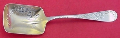Towle Sterling Silver Preserve Spoon Number 38 Gold-Washed Bright-Cut 7 1/8": Towle Sterling Silver Preserve Spoon Number 38 Gold-Washed Bright-Cut 7 1/8" This exquisite sterling silver preserve spoon by Towle features a stunning goldwashed bright-cut finish and a distinctive r