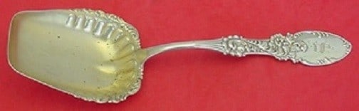 Frank M Whiting Tyrolean Sterling Silver Berry Spoon Goldwashed 8 3/4 inches: Frank M Whiting Tyrolean Sterling Silver Berry Spoon Goldwashed 8 3/4 inches This exquisite Tyrolean berry spoon, crafted by Frank M. Whiting, is made of sterling silver with a beautiful gold wash fin