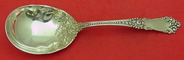 Reed & Barton La Marquise Sterling Silver Berry Spoon 8 3/4 inch Goldwashed Flowers: Reed & Barton La Marquise Sterling Silver Berry Spoon 8 3/4 inch Goldwashed Flowers This exquisite La Marquise Berry Spoon from Reed & Barton is a stunning addition to any table setting. Crafted from 