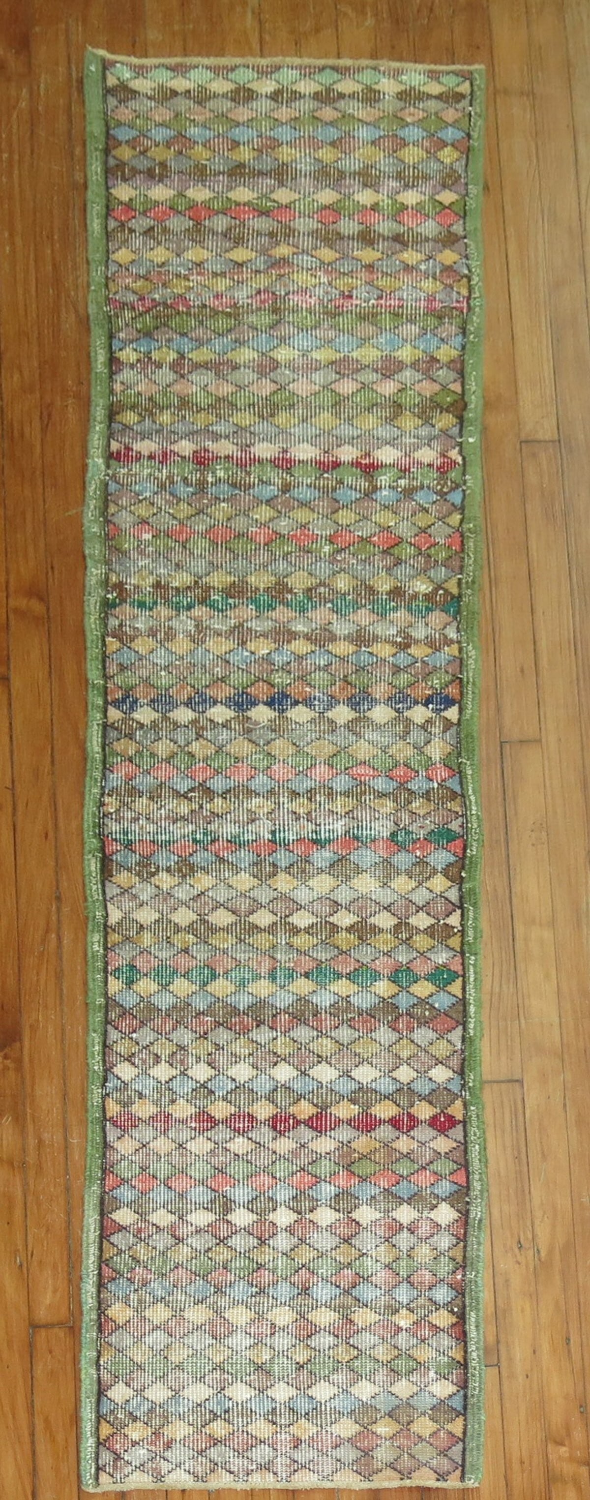 1' 10" x 7' 7" Turkish Anatolian Green Deco Rug Runner: 1' 10" x 7' 7" Turkish Anatolian Green Deco Rug Runner Mid-20th-century Turkish Deco runner in green with a shabby chic look. This pre-owned Anatolian runner offers a narrow, elongated format suited t