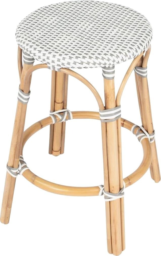 Butler Tobias Coastal Style Rattan Counter Stool 24H Round: Butler Tobias Coastal Style Rattan Counter Stool 24H Round Introducing the Chic Rattan Counter Stool, a perfect addition to elevate your elegant spaces. This counter stool features a natural rattan fr