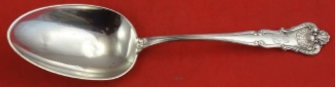 Durgin New Queens Sterling Silver Serving Spoon 9: Durgin New Queens Sterling Silver Serving Spoon 9 This is a sterling silver berry or vegetable serving spoon in the New Queens pattern by Durgin. Measuring 9 inches in length, this elegant serving pie