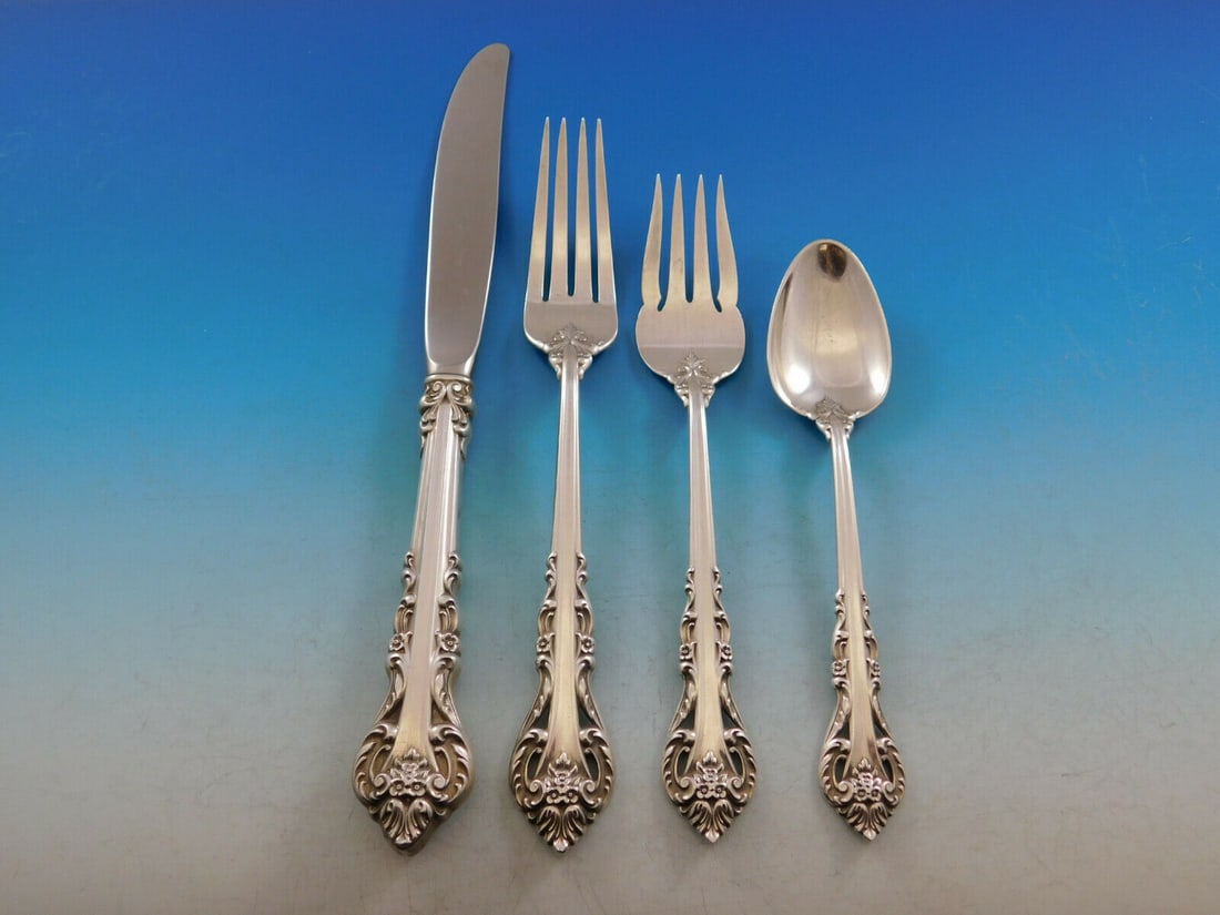 International Sterling Silver Masterpiece 4-Piece Place Setting: International Sterling Silver Masterpiece 4-Piece Place Setting This exquisite 4-piece place setting from the Silver Masterpiece pattern by International Sterling is a stunning addition to any dining 