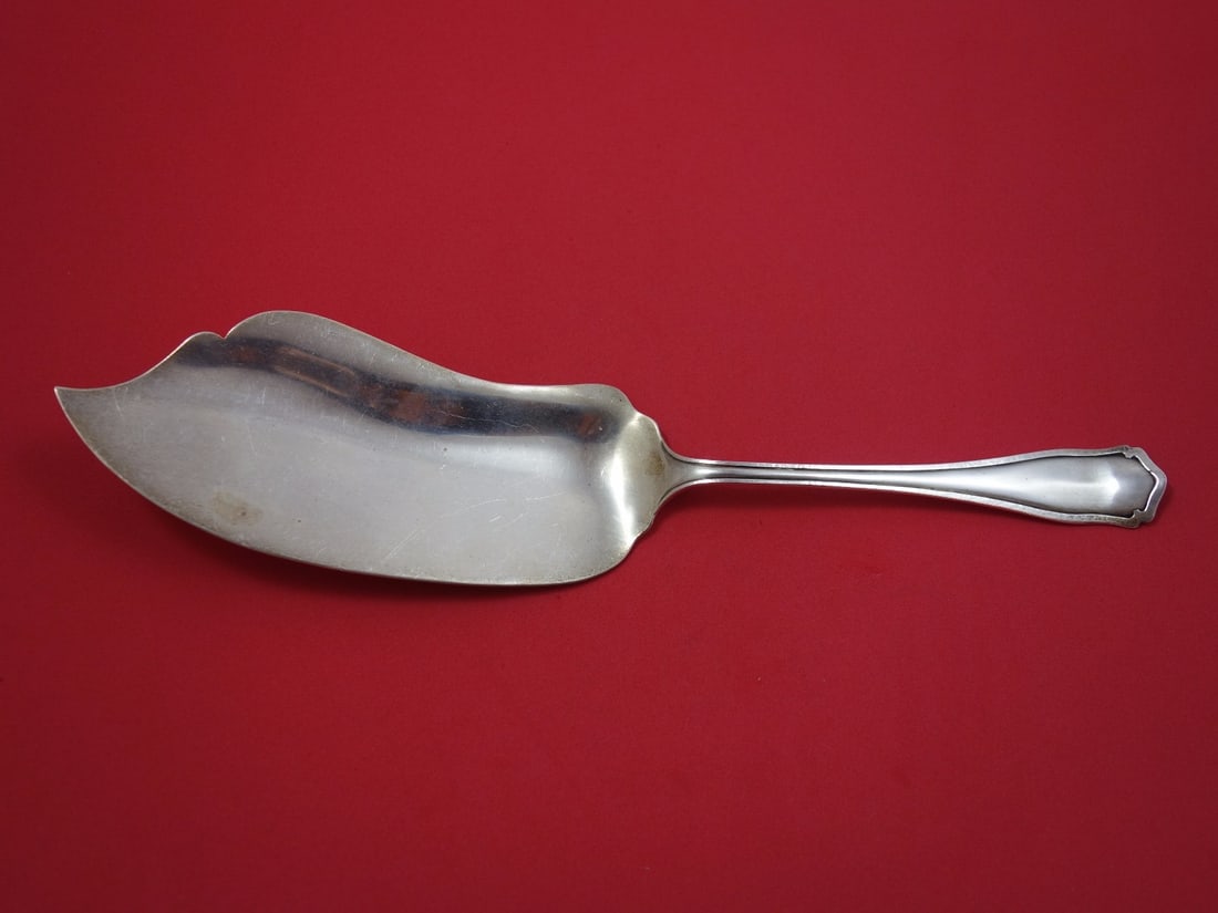 Shreve Dolores Sterling Silver Fish Server 11 5/8" Serving Piece: Shreve Dolores Sterling Silver Fish Server 11 5/8" Serving Piece Crafted in the early to mid-20th century (1900-1940), this Dolores pattern fish server by Shreve is an exquisite piece of sterling silv