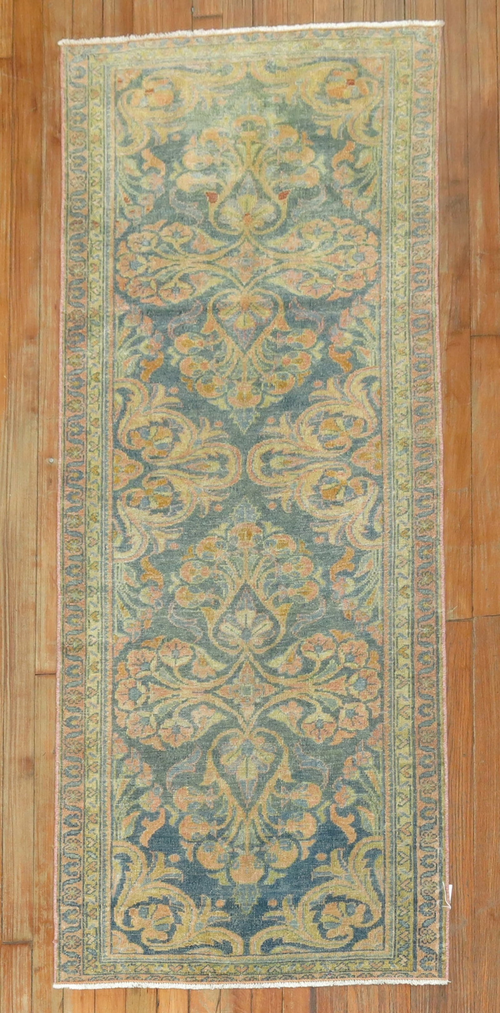 2' 4" x 5' 8" Antique Persian Lilihan Rug Runner: 2' 4" x 5' 8" Antique Persian Lilihan Rug Runner Antique Persian Lilihan runner with intricate floral patterning and accents of orange and pink set against a blue-gray background. Circa 1920, this pre