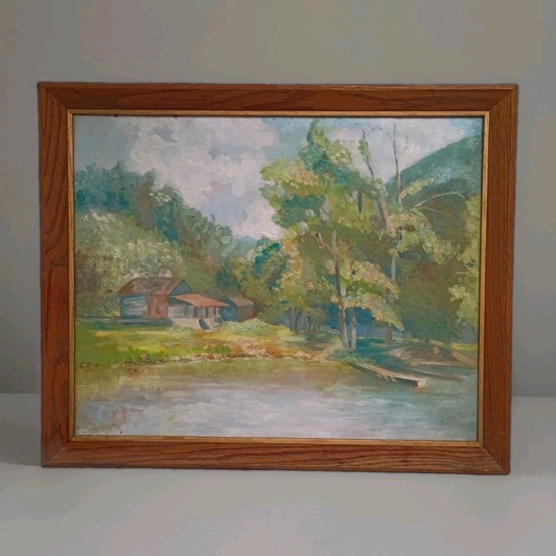 Framed 20 in Gertrude S Zook Fisherman's Delight landscape painting: Framed 20 in Gertrude S Zook Fisherman's Delight landscape painting Original framed painting titled "Fisherman's Delight" by Gertrude S. Zook, depicting a landscape with a hunting and fishing camp the