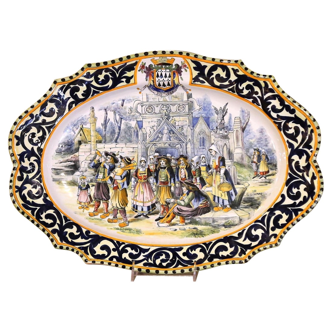 19th Century HB Quimper Painted Faience Serving Platter France: 19th Century HB Quimper Painted Faience Serving Platter France This stunning large 19th Century French painted faience serving platter, signed HB Quimper, is an exquisite piece that adds a touch of hi