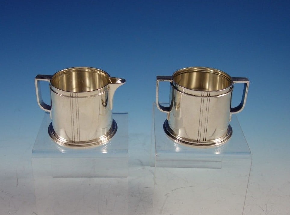 Tiffany and Co. Century Sterling Silver Sugar Creamer Set 2pc: Tiffany and Co. Century Sterling Silver Sugar Creamer Set 2pc Introducing the exquisite Century by Tiffany and Co. Sterling Silver Sugar and Creamer Set, a stunning addition to any table setting. Craf