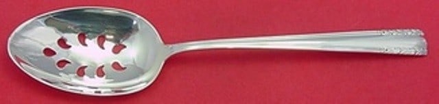 Alvin Chapel Bells Sterling Silver Pierced Serving Spoon 8.5 Inch: Alvin Chapel Bells Sterling Silver Pierced Serving Spoon 8.5 Inch Elevate your dining experience with this exquisite Chapel Bells Sterling Silver Serving Spoon by Alvin. This slotted spoon features a 
