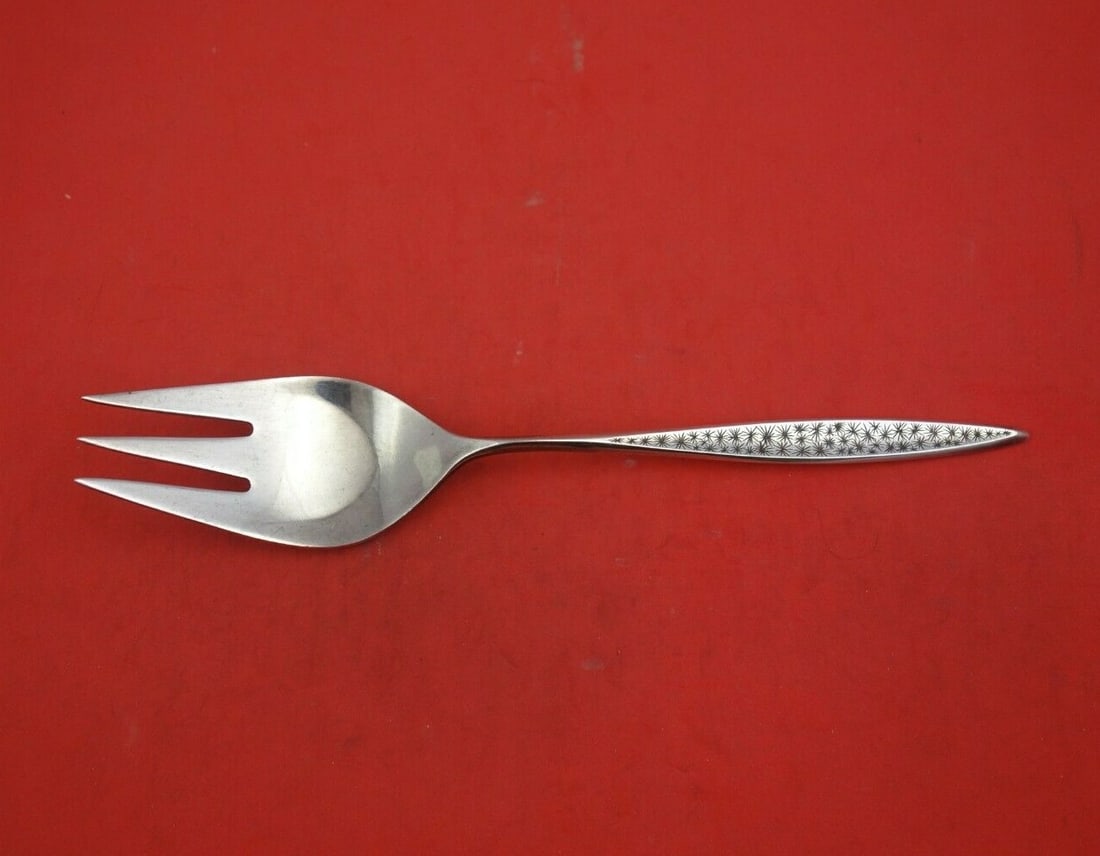 International Sterling Silver Snowflake Serving Fork 9 1/4 inches: International Sterling Silver Snowflake Serving Fork 9 1/4 inches Enhance your dining experience with this exquisite Snowflake serving fork from International Sterling. Crafted from high-quality sterl