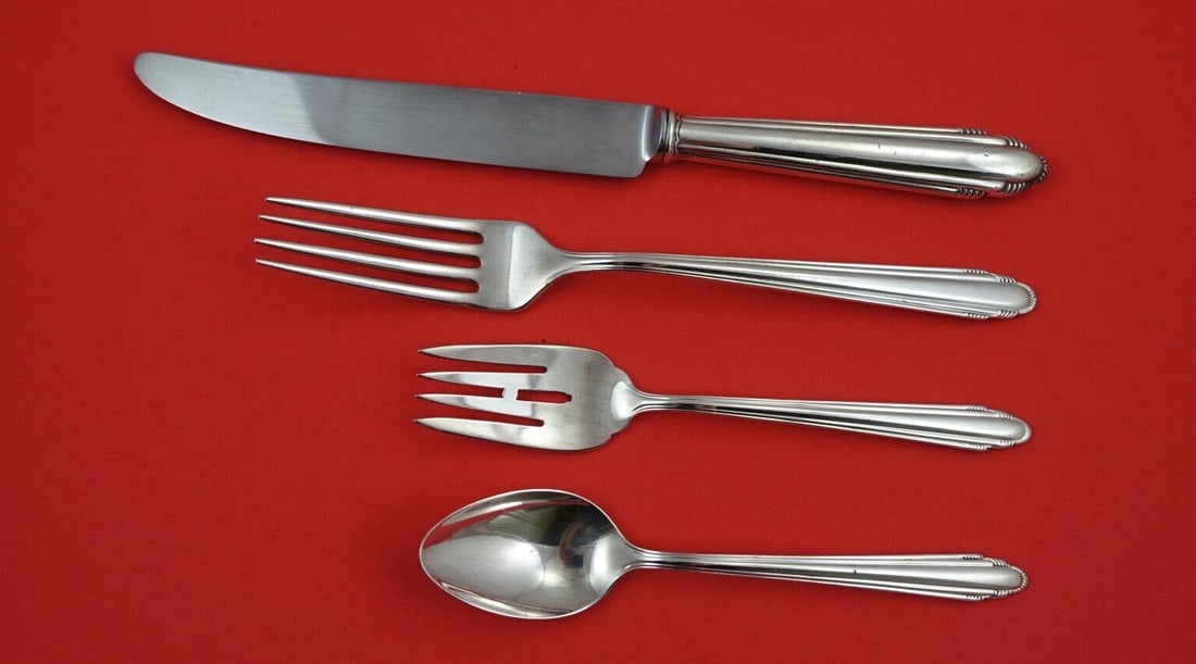 Dominick & Haff Contempora Sterling Silver 4-Piece Dinner Set: Dominick & Haff Contempora Sterling Silver 4-Piece Dinner Set This exquisite 4-piece dinner setting in the Contempora pattern by Dominick & Haff showcases classic elegance in sterling silver. The set 