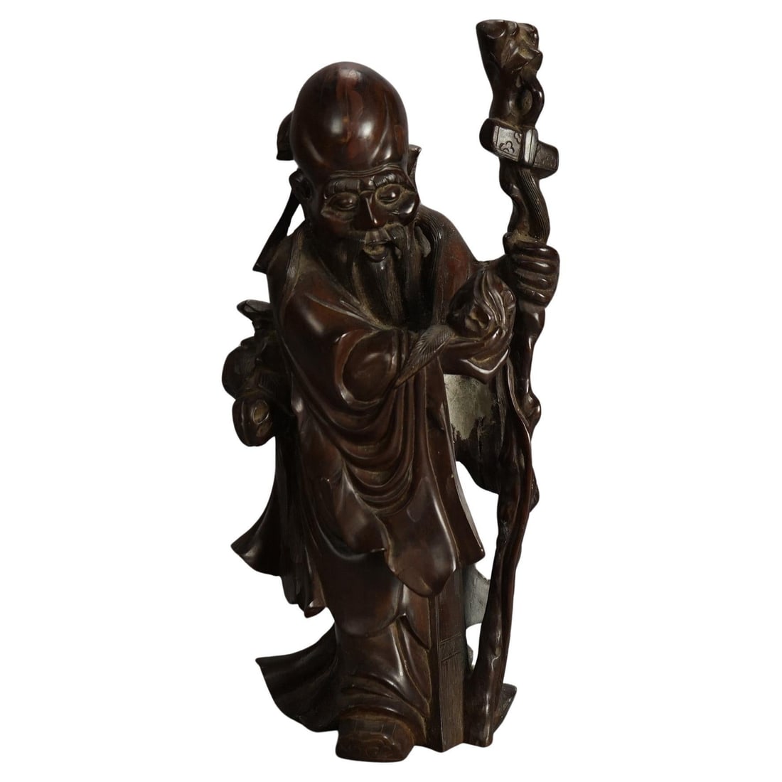 Vintage 1940 Asian Carved Rosewood Buddha Figure 16.75" Tall: Vintage 1940 Asian Carved Rosewood Buddha Figure 16.75" Tall This exquisite standing figure, crafted from rosewood around 1940, depicts a Buddha or wise man in a traditional pose. Measuring 16.75 inch