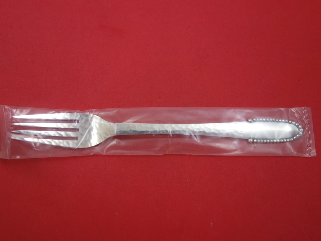 Georg Jensen Beaded Sterling Silver Luncheon Fork 6 7/8 inches New: Georg Jensen Beaded Sterling Silver Luncheon Fork 6 7/8 inches New This exquisite luncheon fork from Georg Jensen showcases the timeless Beaded pattern. Crafted from high-quality sterling silver, this