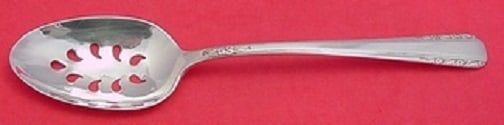 International Sterling Silver Courtship Slotted Serving Spoon 8.5": International Sterling Silver Courtship Slotted Serving Spoon 8.5" This exquisite serving spoon features the elegant Courtship pattern by International Sterling. Crafted from high-quality sterling