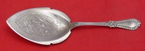 Gadroon Pattern Sterling Silver Pie Server Wood & Hughes 8 7/8": Gadroon Pattern Sterling Silver Pie Server Wood & Hughes 8 7/8" This exquisite pie server, crafted in the Gadroon pattern by Wood & Hughes, is a stunning example of 19th-century silverware. Made from 
