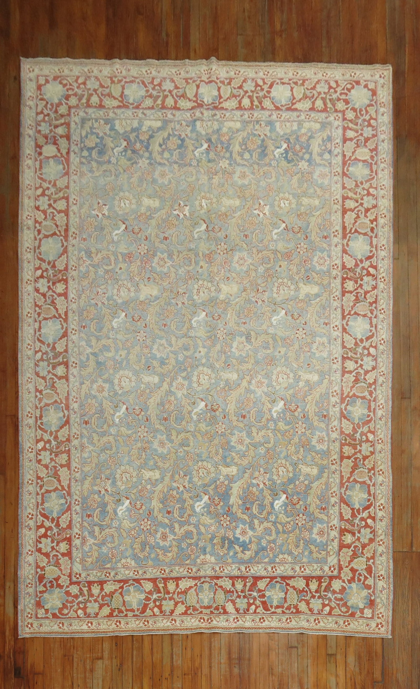 7' 4" x 11' 1" Persian Qum pictorial room rug wool silk: 7' 4" x 11' 1" Persian Qum pictorial room rug wool silk Early 20th century Persian pictorial Qum room-size rug with silk and wool highlights. The design features a powder blue field with a red border.
